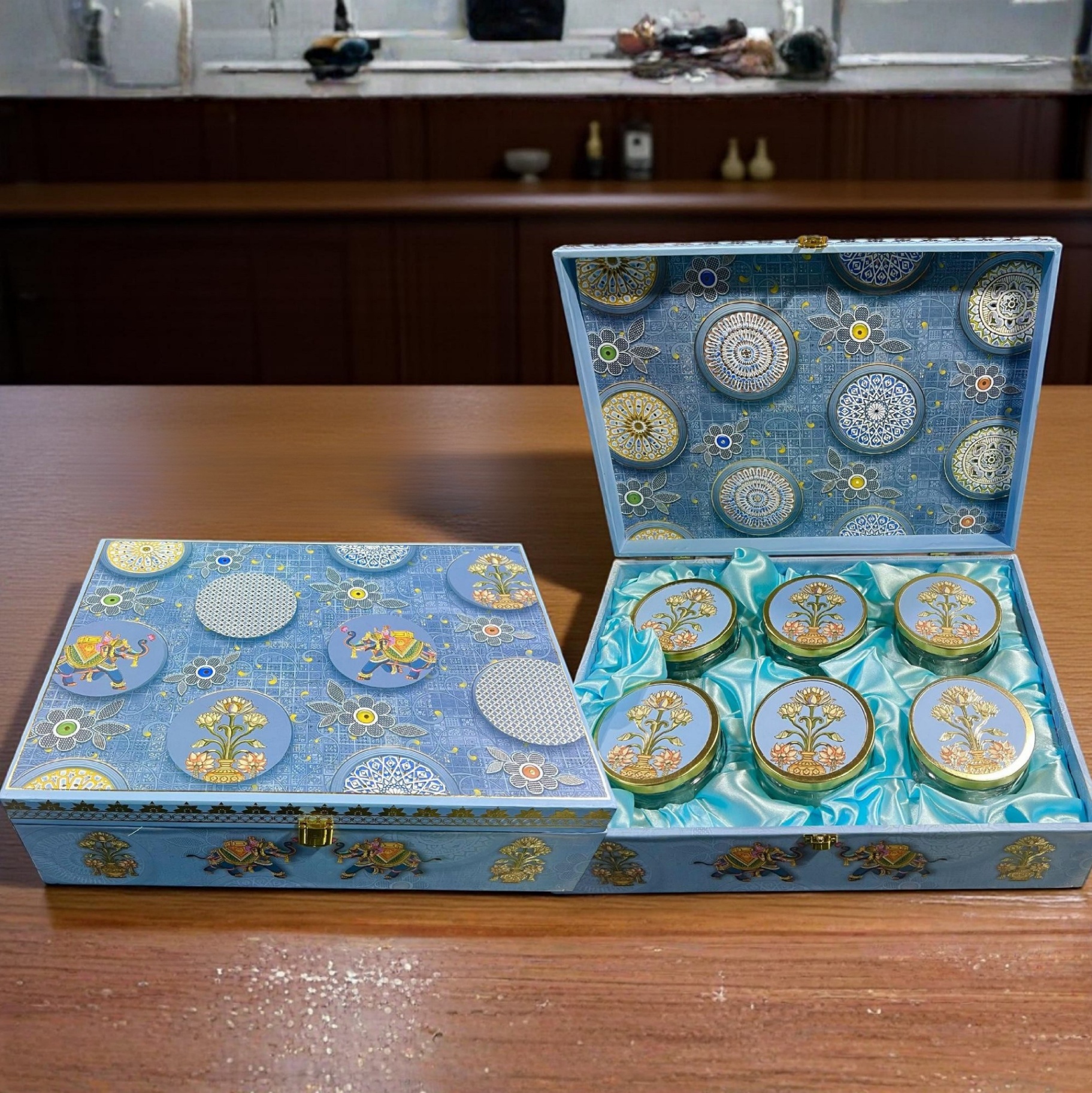Closed Maharaja Delight hamper box with royal elephant and lotus tree motif in powder blue