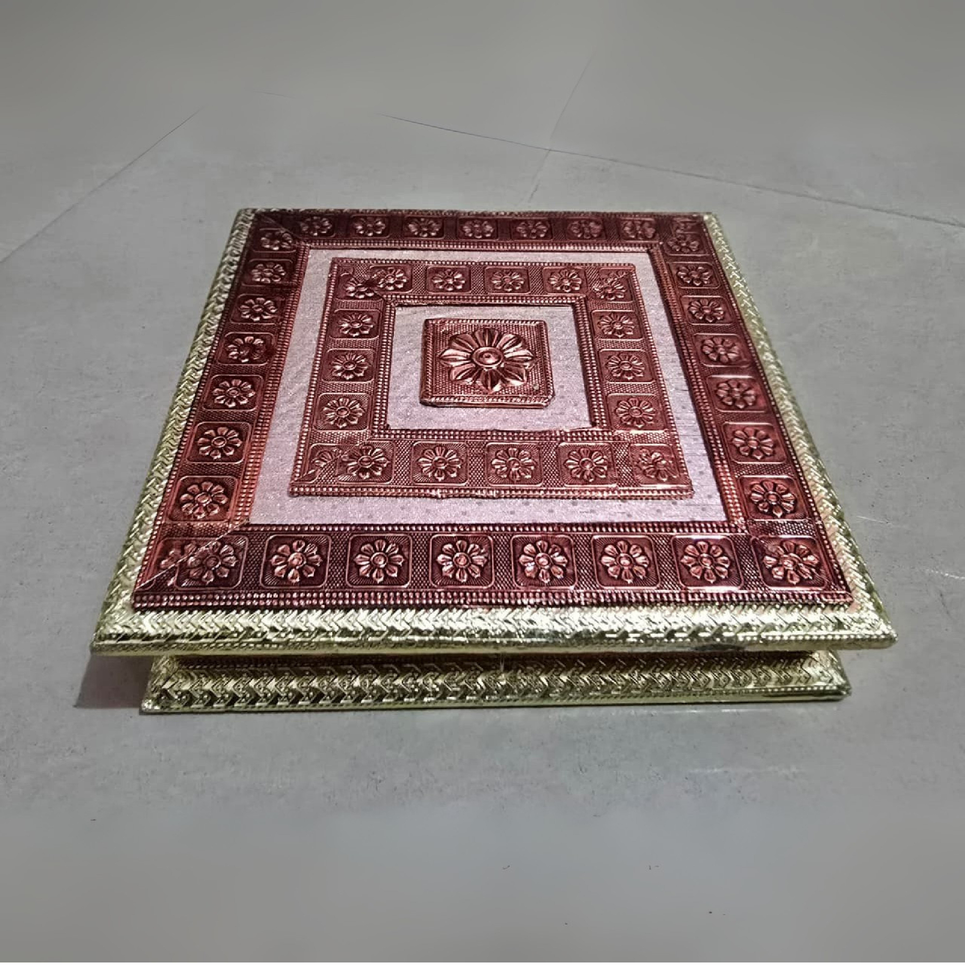Closed Heritage hamper box with embossed brass and copper floral design