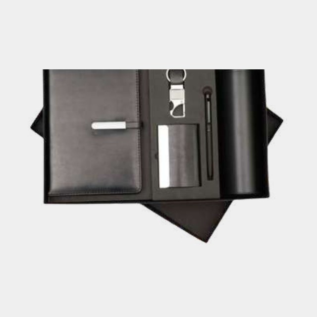 Black leather executive folder gift set with metal pen, keychain, card holder and bottle opener