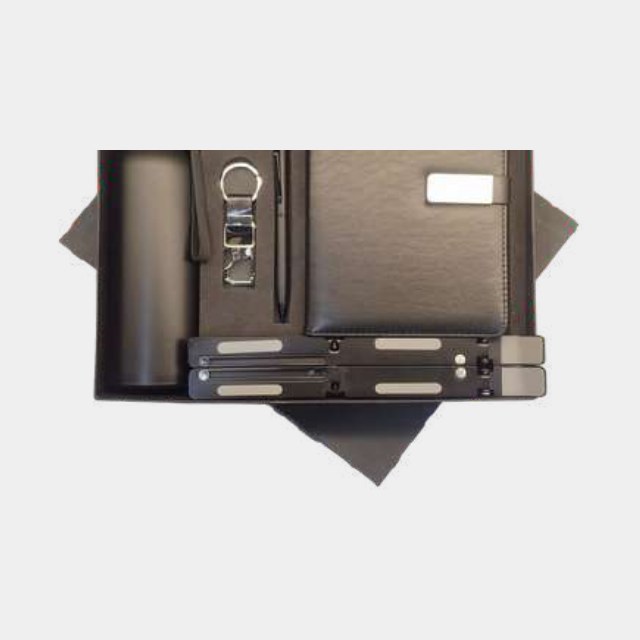 Executive gift set with foldable aluminium laptop stand, notebook, metal pen and keychain