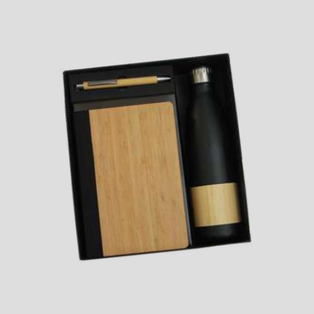 Bamboo-cover notebook with black insulated bottle and brass pen in a fitted gift tray