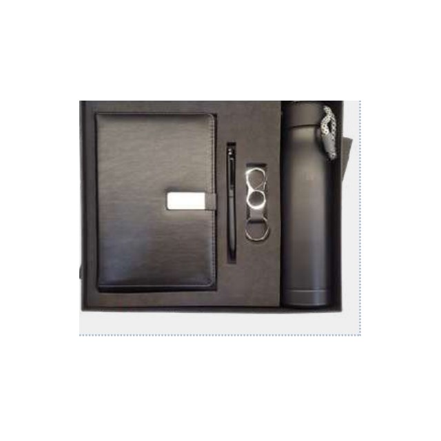 Brown leather notebook with vacuum-insulated steel bottle and metal pen in a fitted tray