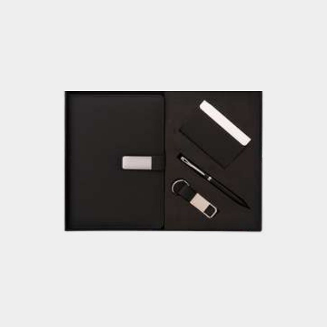 Black leather A5 notebook with matching card holder and keychain in a fitted tray