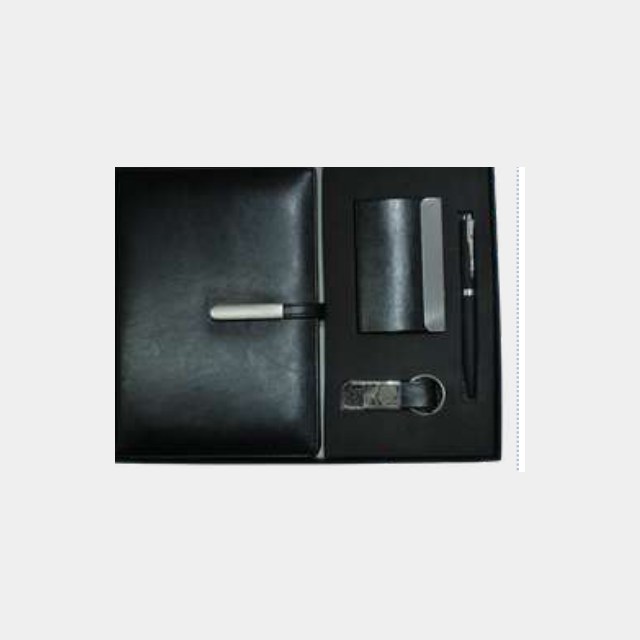 Black A5 leather notebook with slim metal pen and card holder in a fitted tray