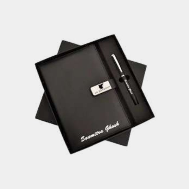 Black leather A5 notebook with an individually printed recipient name, and a matching metal pen
