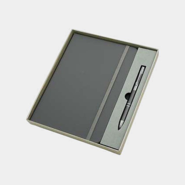Sage grey-green A5 elastic notebook with metal pen in a tone-matched tray