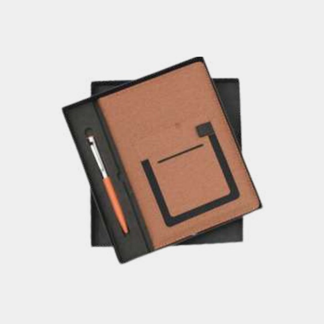 Tan woven-fabric notebook with debossed square frame and a turned wooden pen