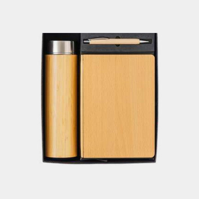 Light wood-cover notebook with brushed steel bottle and turned wooden pen