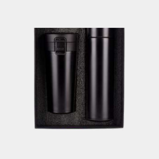 Matte black travel tumbler with a temperature-display insulated bottle in a fitted box