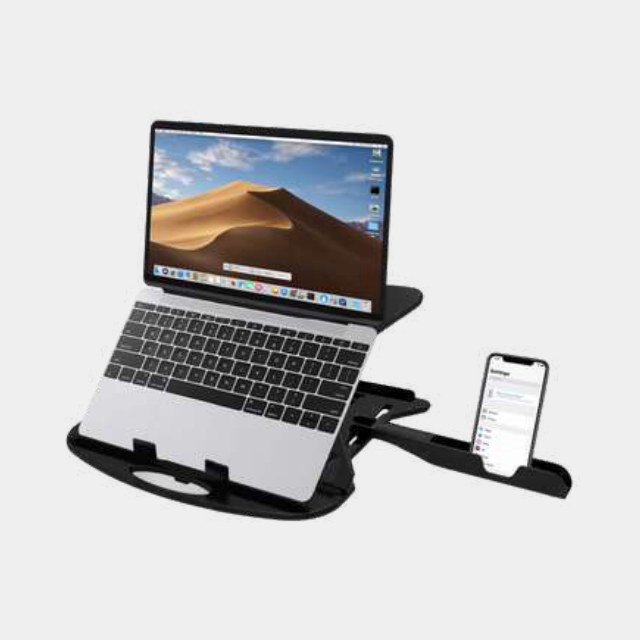 Foldable laptop stand raising a laptop to eye level, with a phone held alongside
