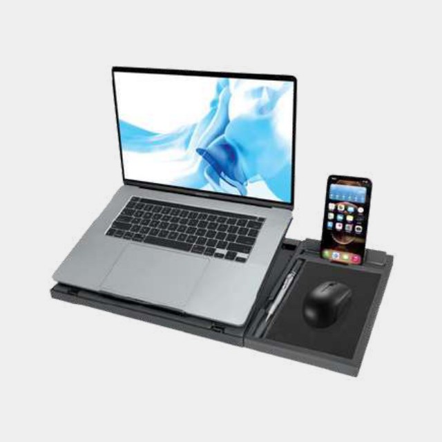 Laptop desk station with an integrated phone dock, pen slot and mouse surface