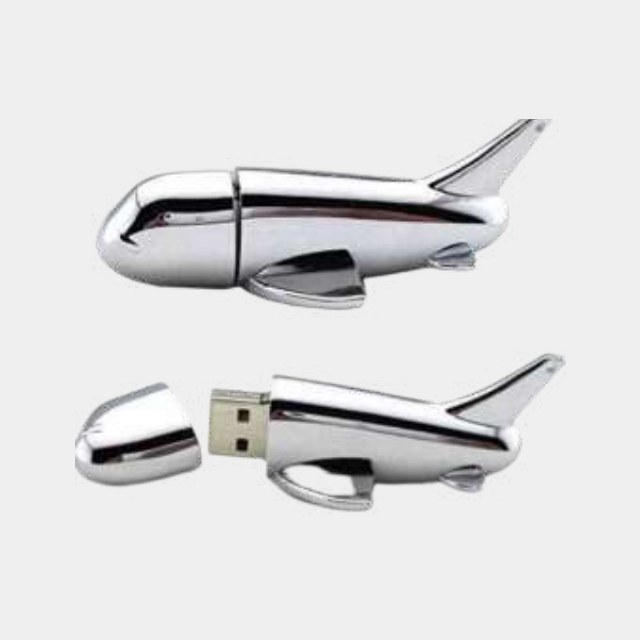 Chrome aeroplane-shaped USB drive with the connector in the fuselage