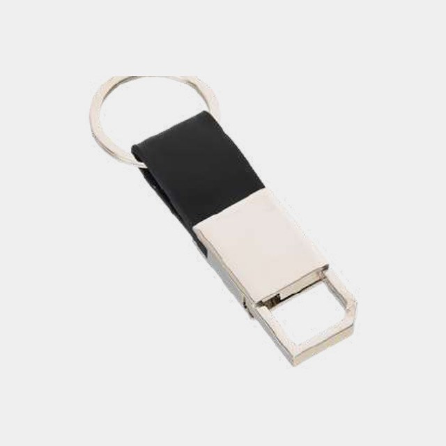 Chrome keychain with a black leather strap and a wide rectangular engraving plate