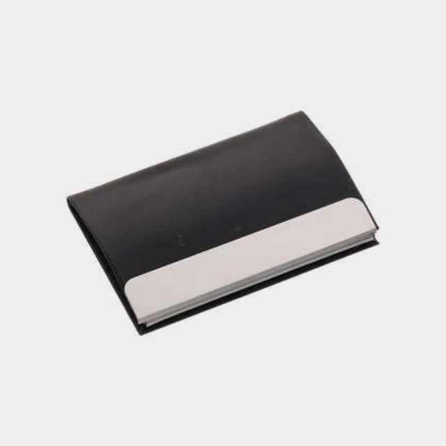 Black leather card holder with a curved brushed steel front and magnetic flap