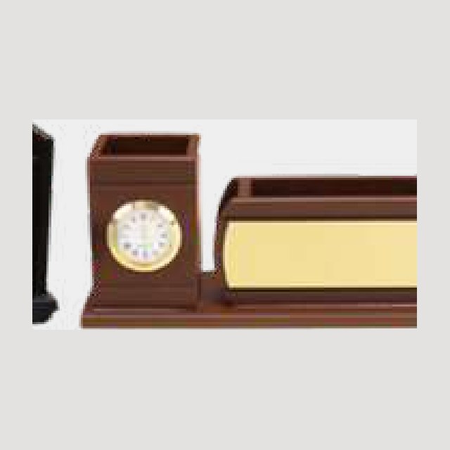 Dark wood pen stand with a round analogue clock and a memo tray